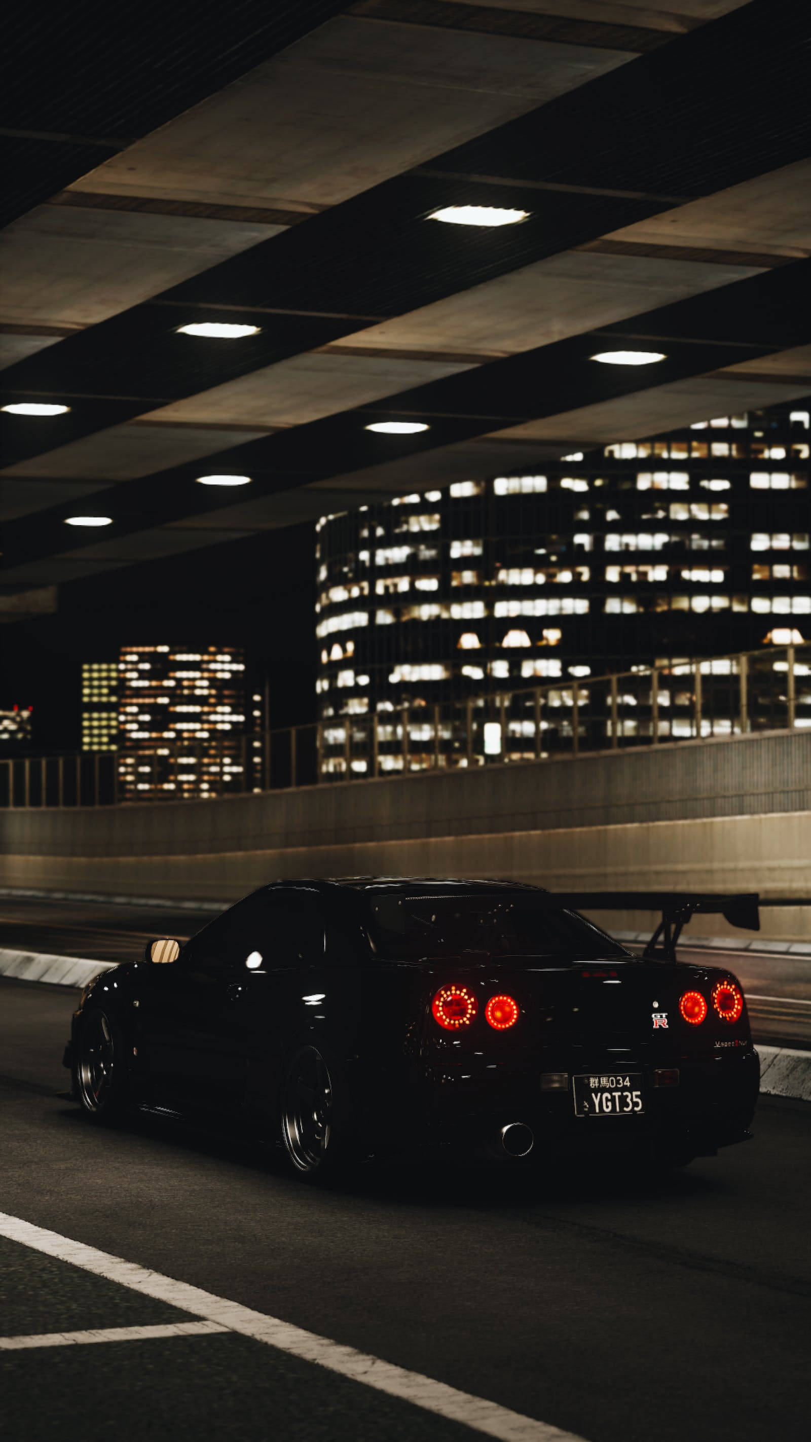 Ánh đèn và chiếc Nissan GT R màu đen 4K Hình nền
