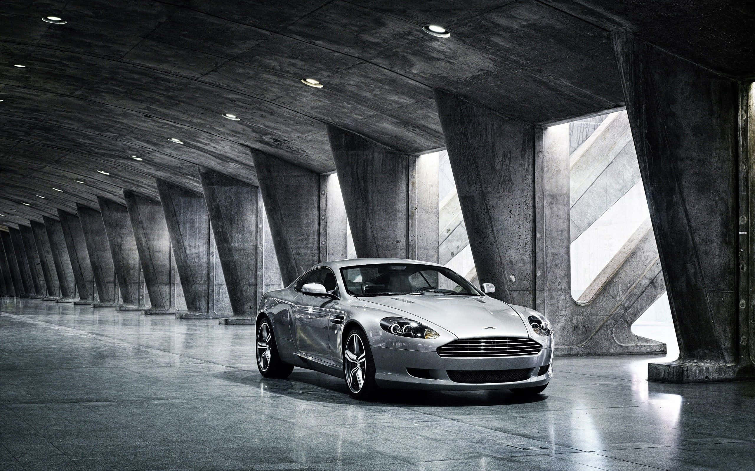 Aston Martin DB9 lướt qua khung cảnh thành phố đẹp như tranh Hình nền