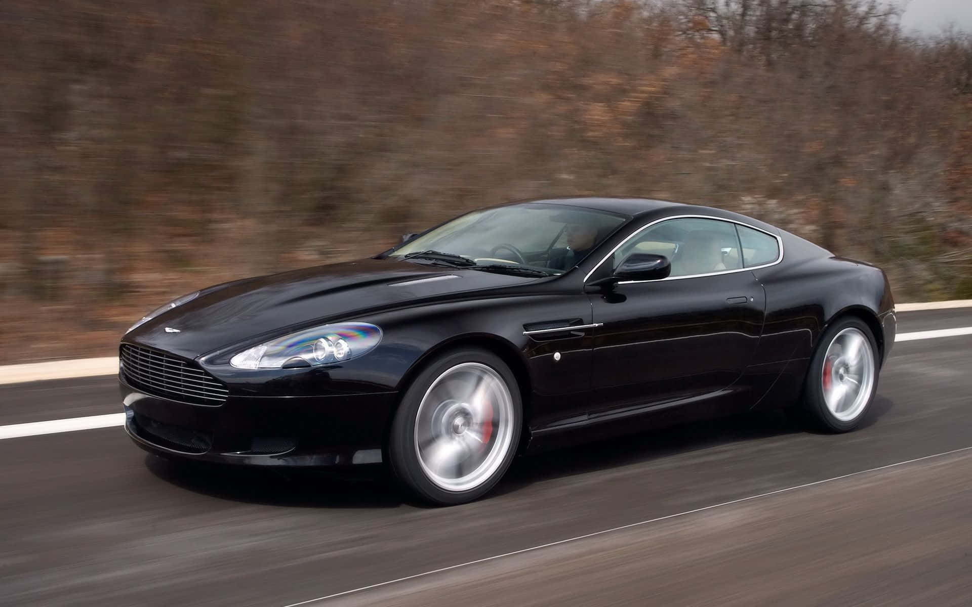 Aston Martin DB9 Thanh Lịch trên đường mở Hình nền