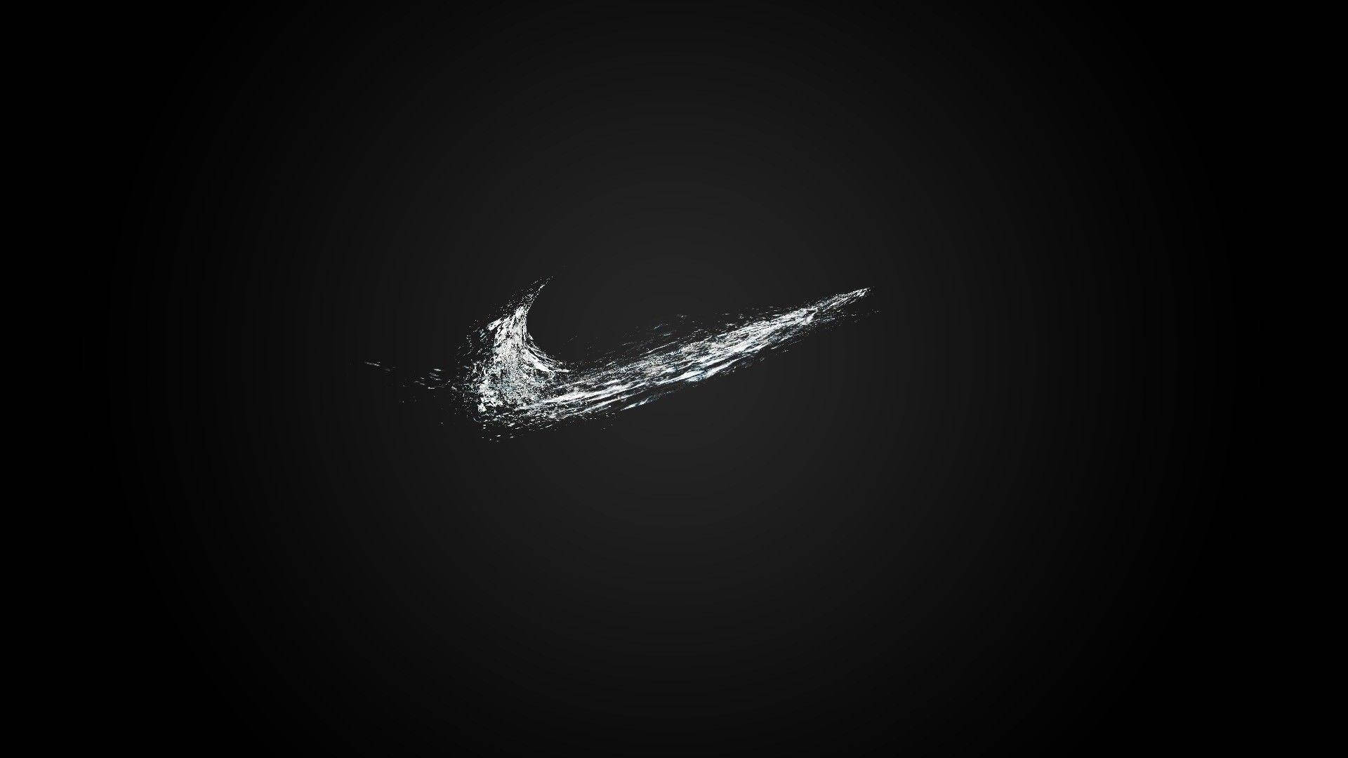 Biểu tượng Nike đơn giản, người que màu đen ngầu nhìn vào máy tính Hình nền