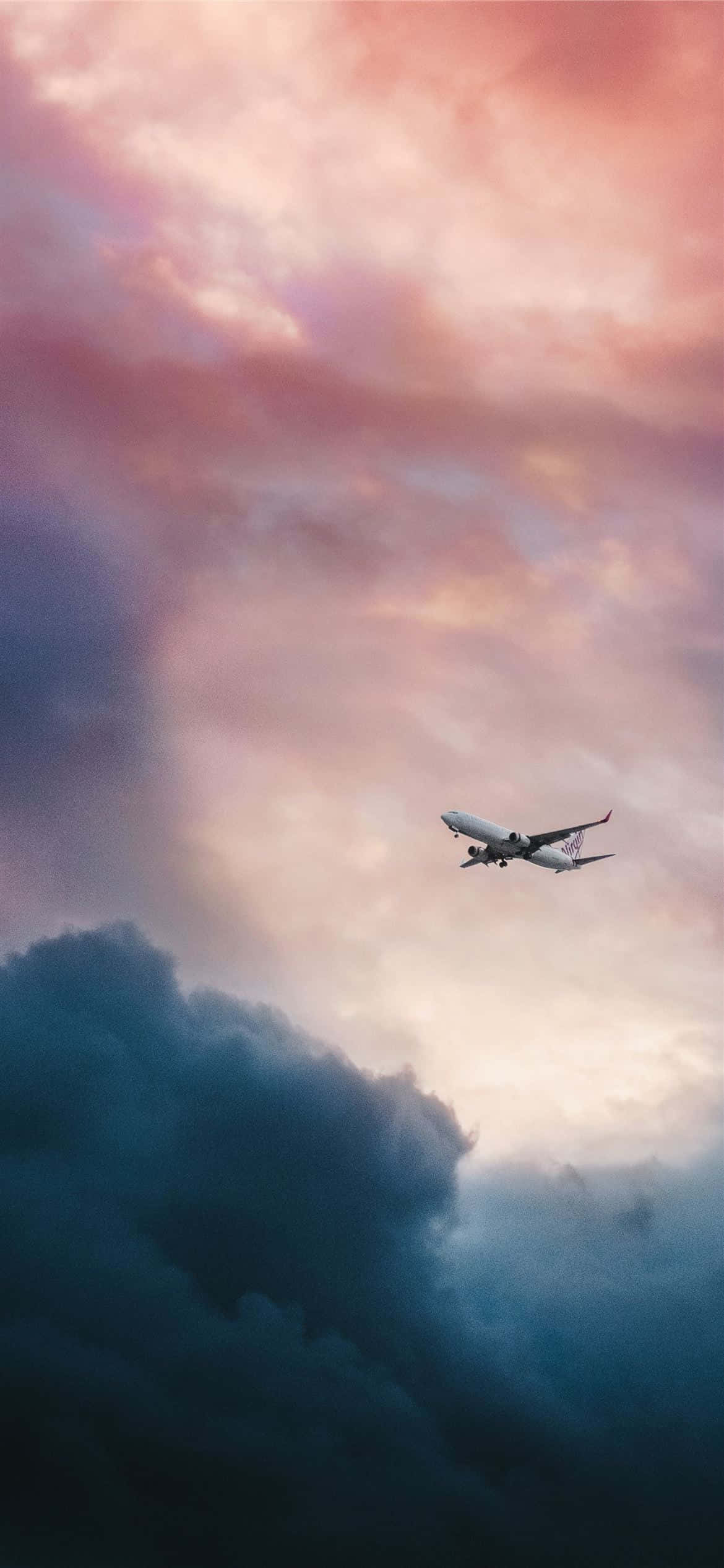 Bình minh tuyệt đẹp trên một chiếc máy bay thương mại đang bay. Hình nền