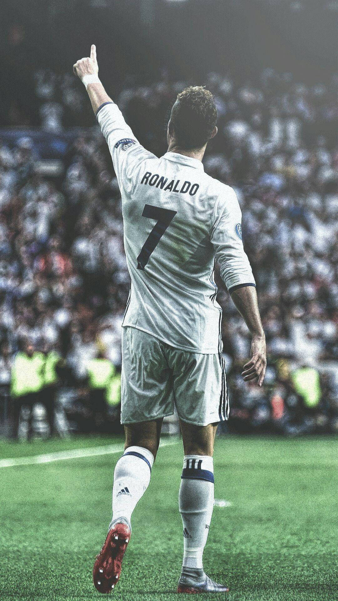Cristiano Ronaldo chỉ tay lên iPhone Hình nền