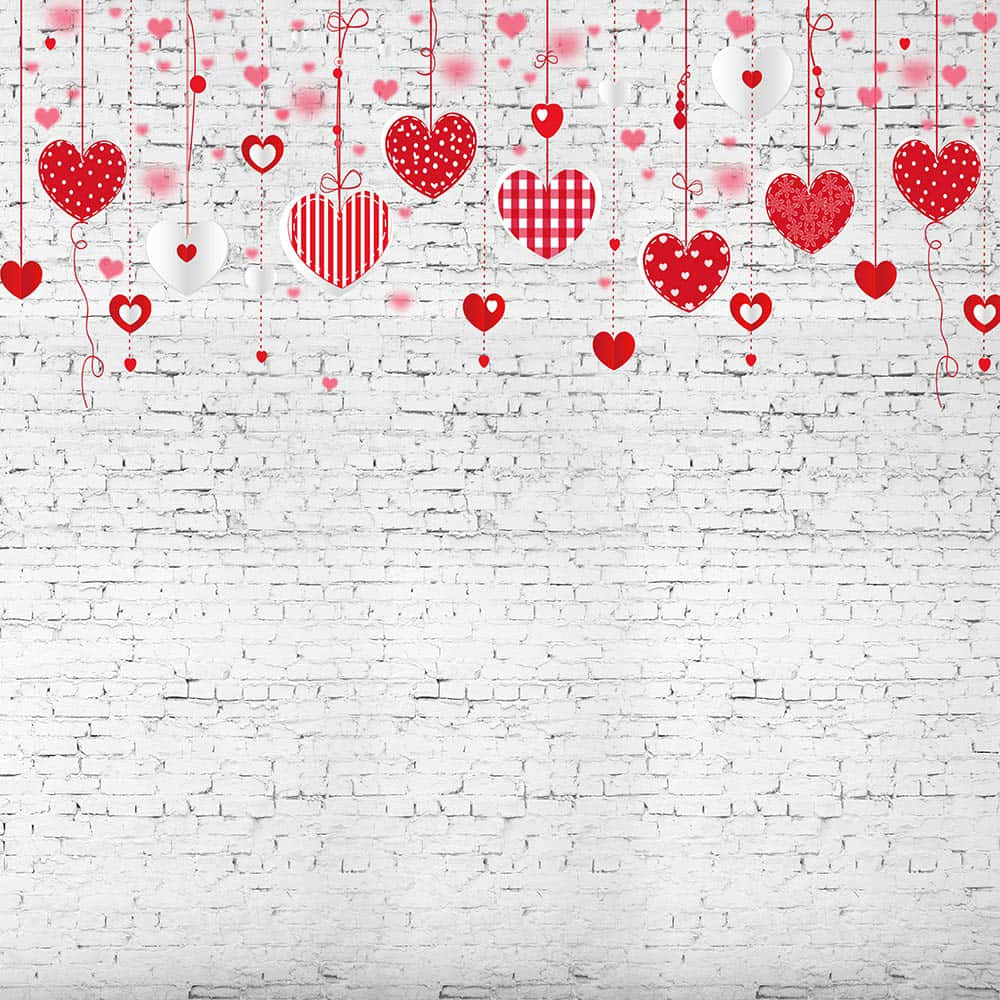Dải băng trái tim Valentine màu đỏ dễ thương trên nền tường gạch Hình nền