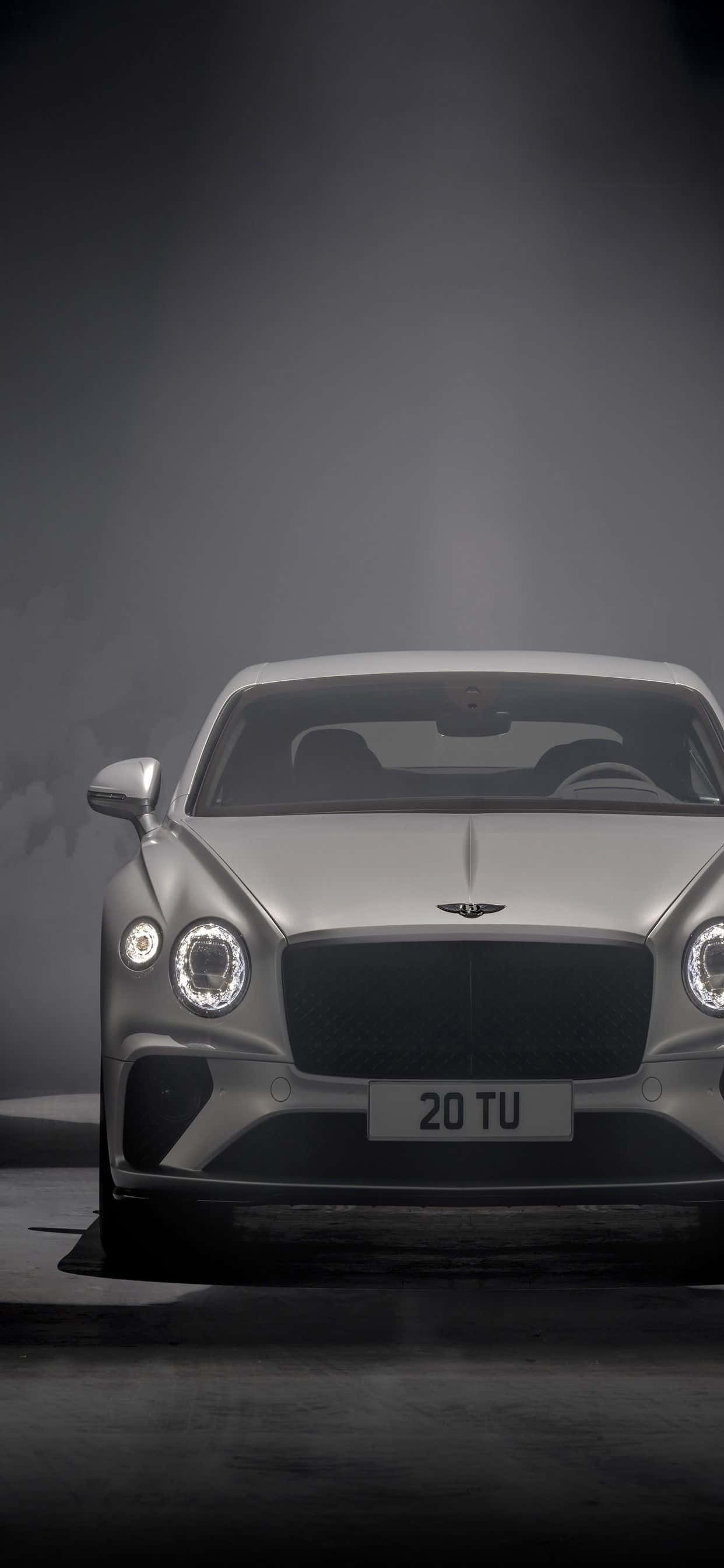 Đắm Mình Trong Xa Hoa: Một Chiếc iPhone Xs Max Trong Xe Bentley Hình nền