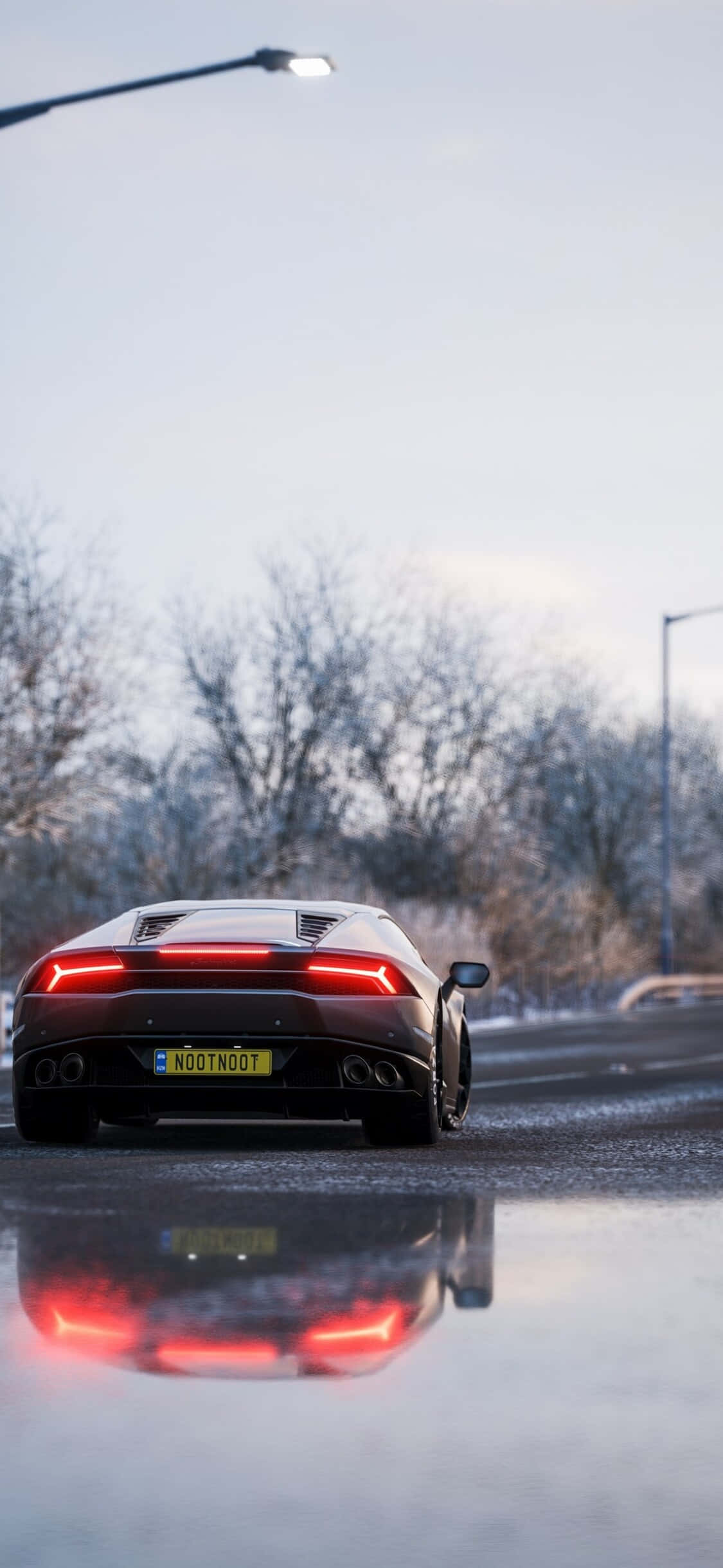 Hình nền iPhone X Forza Motorsport 7 với xe Lamborghini Huracan đen Hình nền