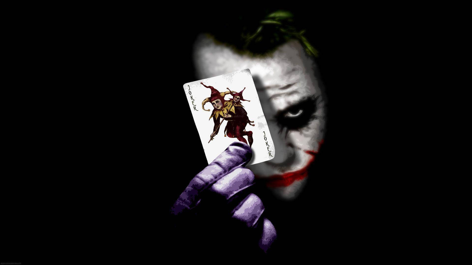Joker Cầm Lá Bài Hình nền