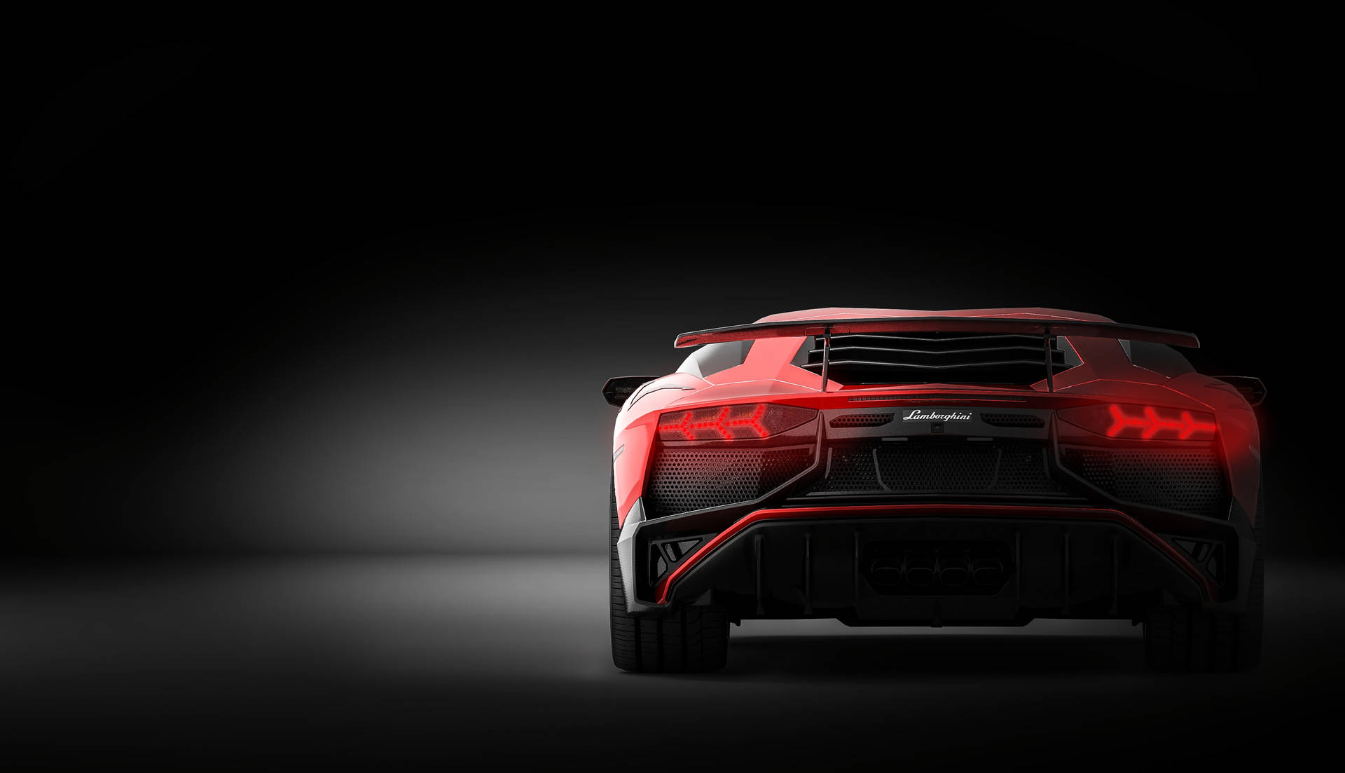 Hình nền Lamborghini Aventador màu đỏ nhìn từ phía sau.