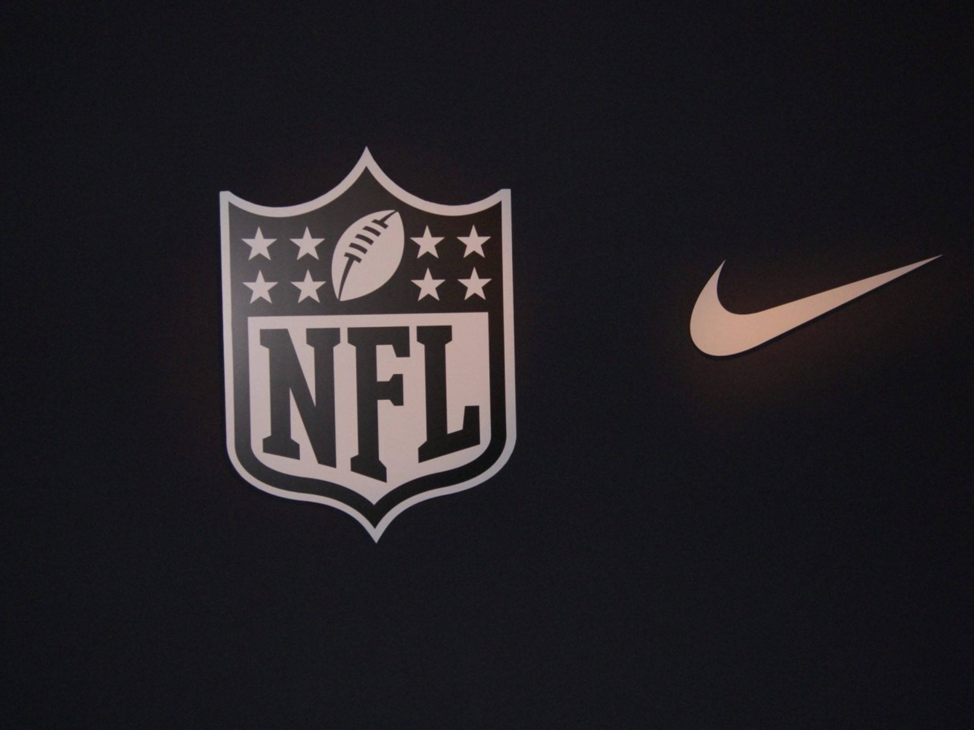 Logo NFL Bóng bầu dục và Nike Hình nền