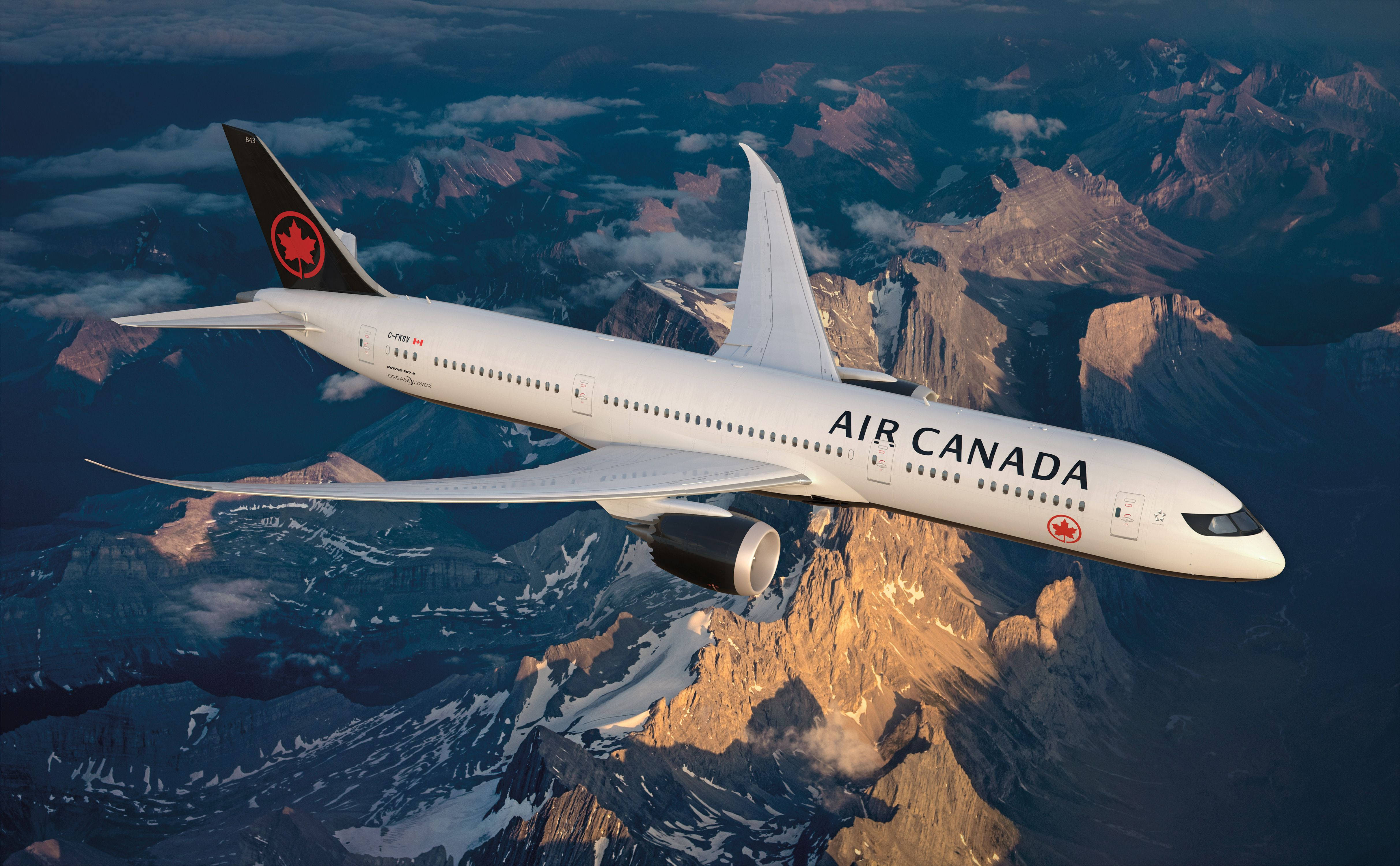 Máy bay Air Canada trên những ngọn núi Hình nền