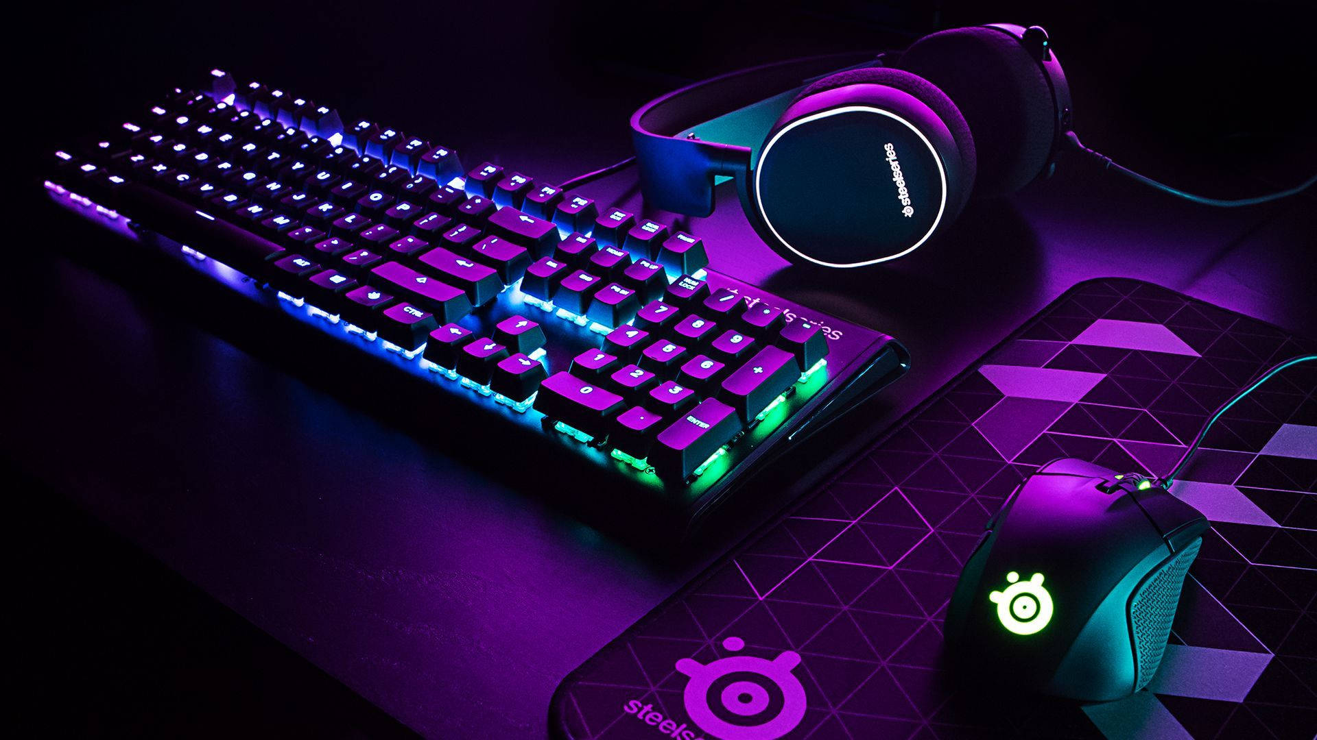 Máy tính chơi game màu tím để bàn Hình nền