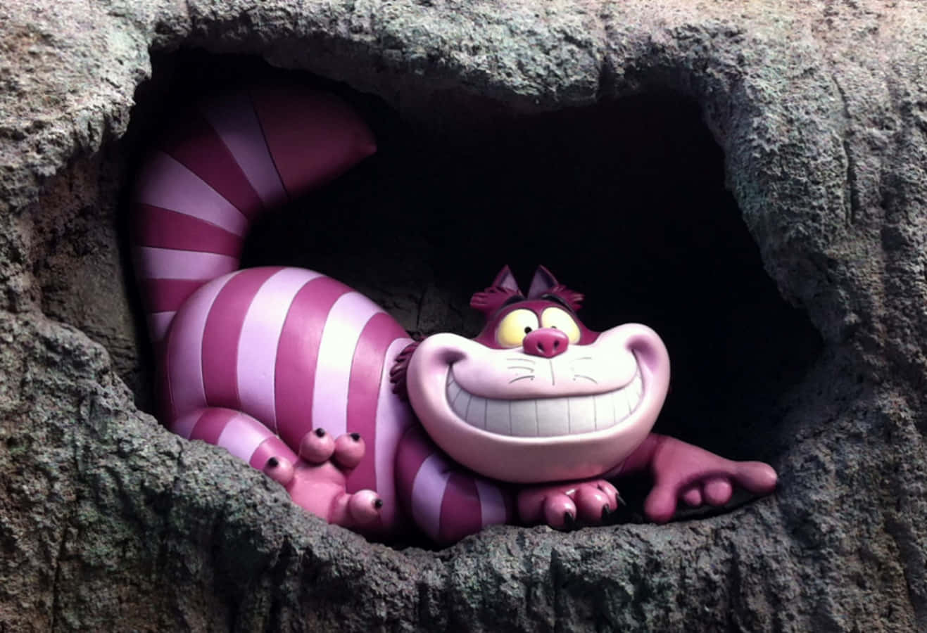 Mèo Cheshire tò mò nhìn ra từ thế giới như mộng ảo, đầy màu sắc. Hình nền