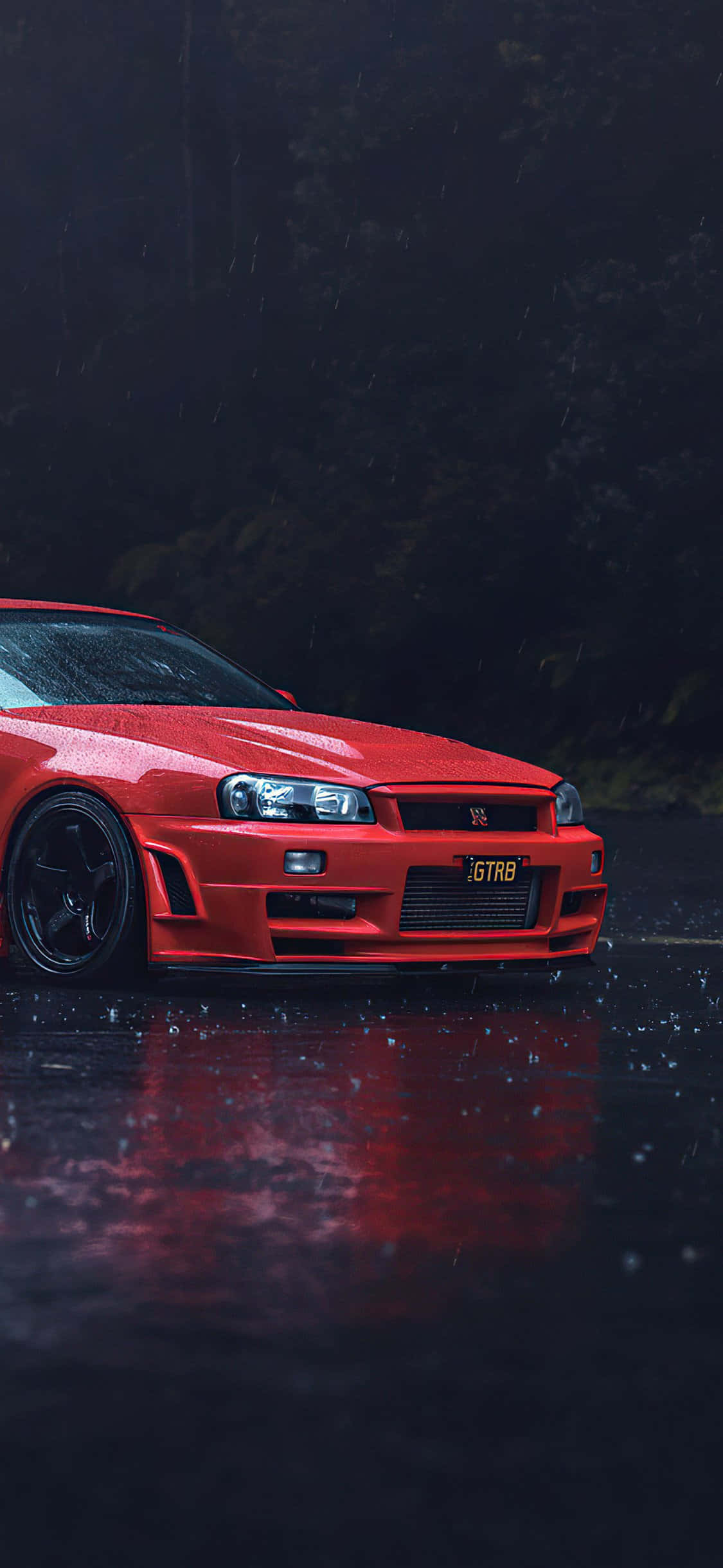 một chiếc xe màu đỏ đỗ dưới mưa Hình nền