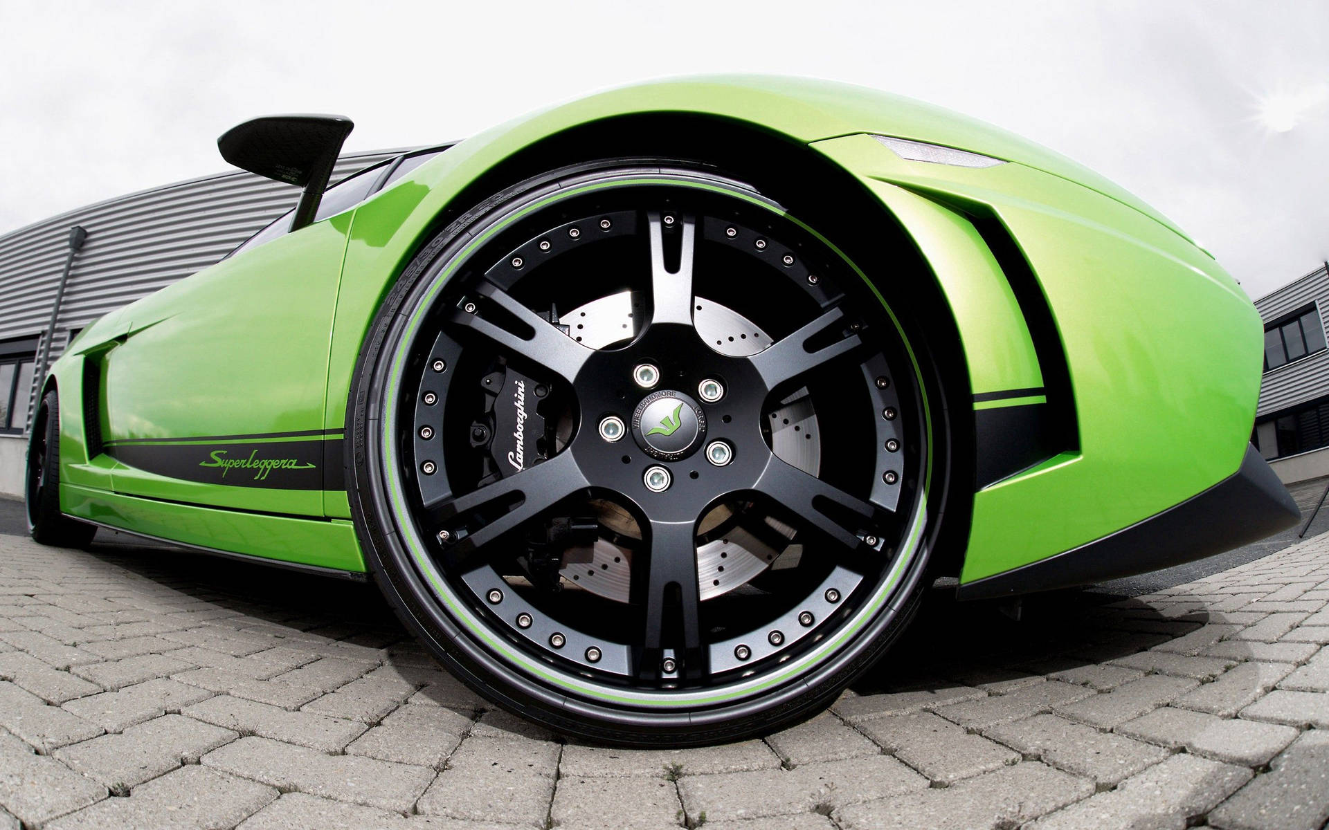 Hình nền Lamborghini xanh góc mắt cá bánh xe.