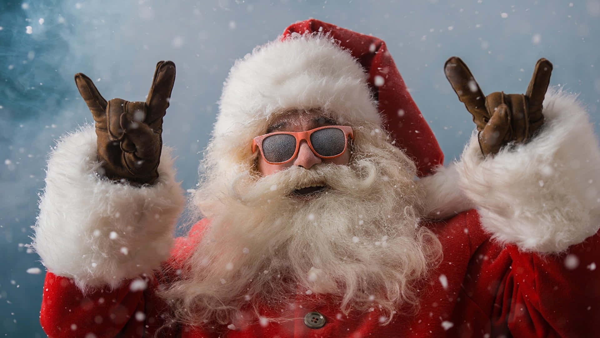 Ông già Noel vui nhộn làm ký hiệu rock and roll trên nền Zoom Giáng sinh Hình nền