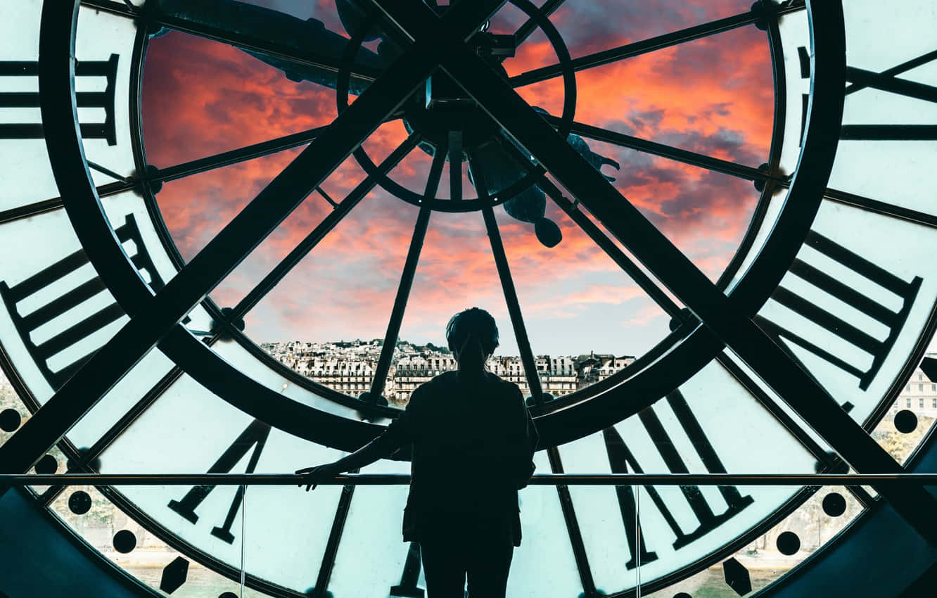 Đồng hồ khổng lồ với cảnh hoàng hôn tại Musée d'Orsay Hình nền