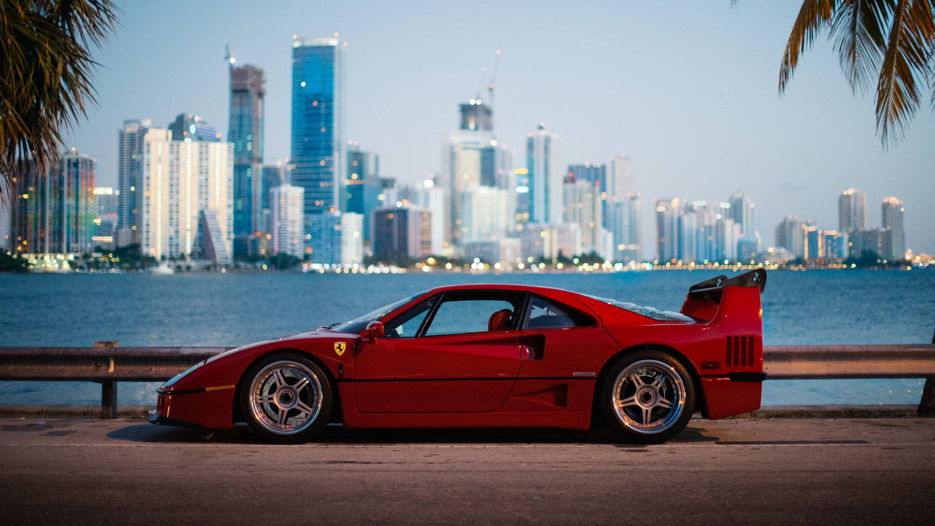 Ferrari đỏ gần các tòa nhà iPad