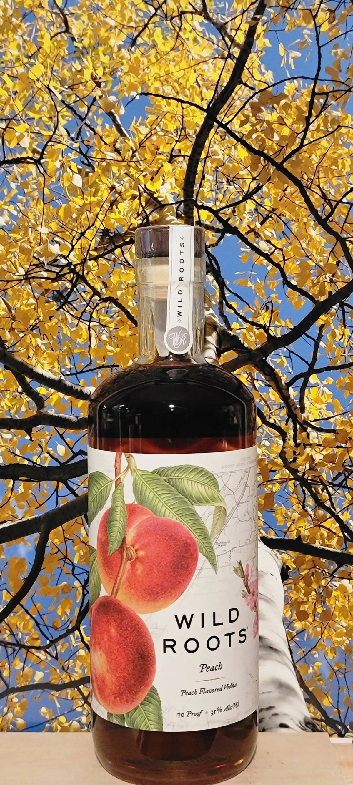 Rượu vodka đào tươi mát từ Wild Roots Hình nền