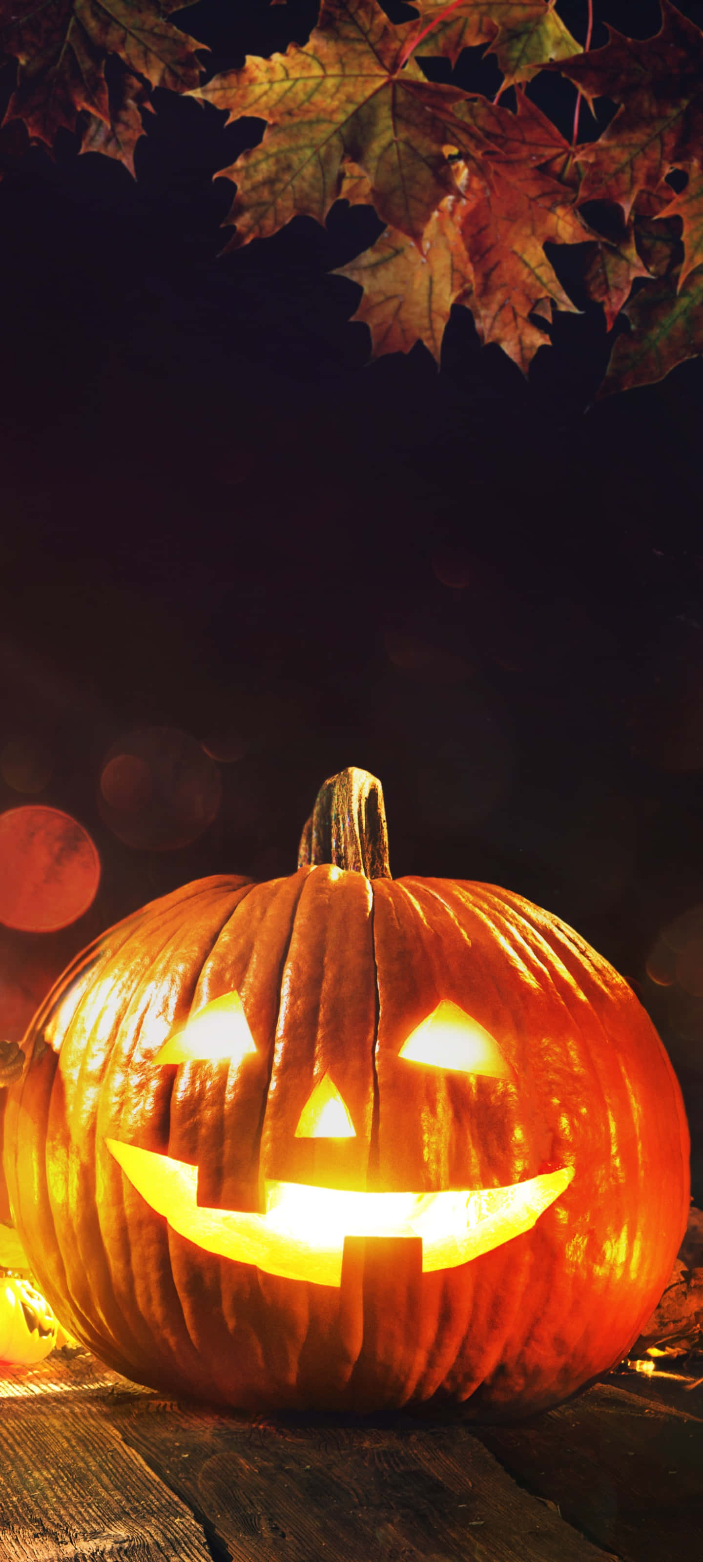 Sẵn sàng cho niềm vui ma quái với hình nền điện thoại Halloween này! Hình nền
