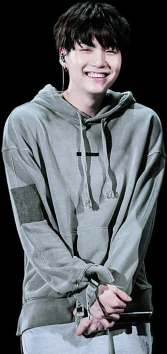 Sao K Pop mỉm cười trong áo hoodie xám Hình nền