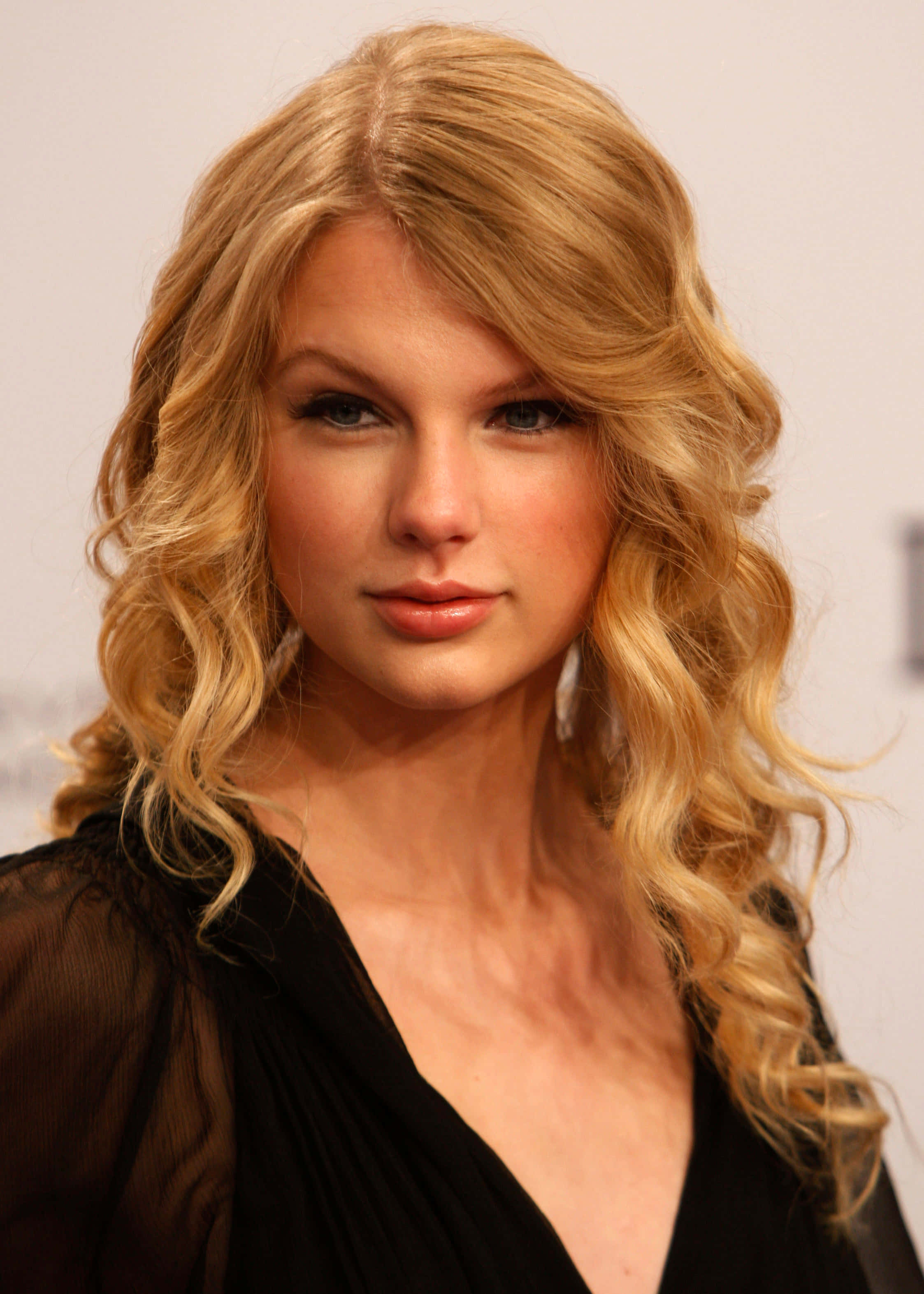 Taylor Swift biểu diễn trên sân khấu trong một buổi hòa nhạc Hình nền