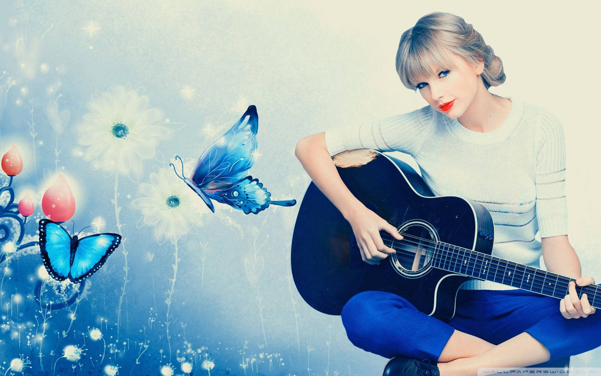 Hình nền Taylor Swift chơi guitar nền xanh