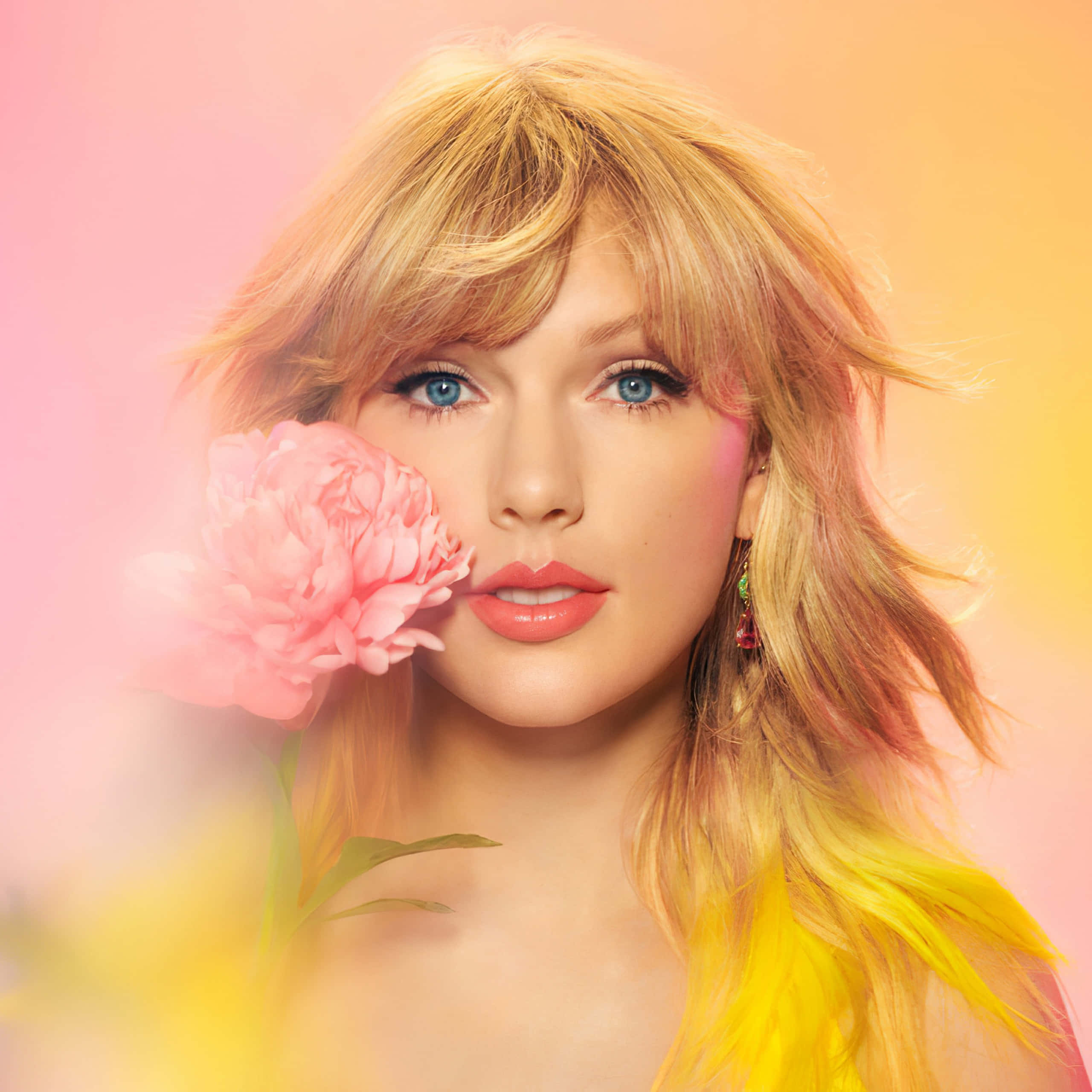 Taylor Swift tỏa sáng dưới ánh đèn sân khấu Hình nền
