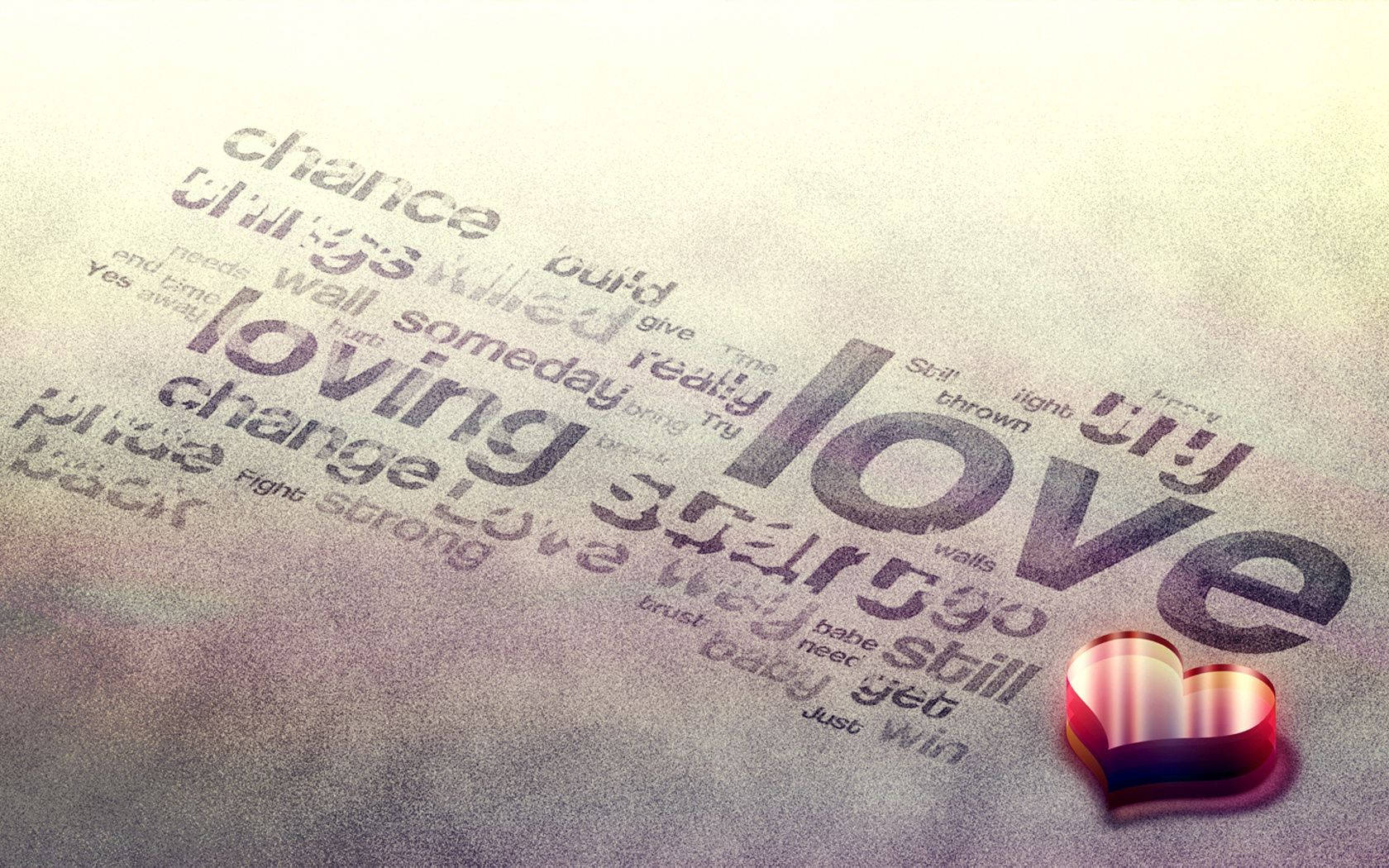 Những từ ngữ tình yêu khác nhau như 'loving' được viết trên bề mặt xám với một trái tim 3D màu đỏ sáng bóng ở bên cạnh.