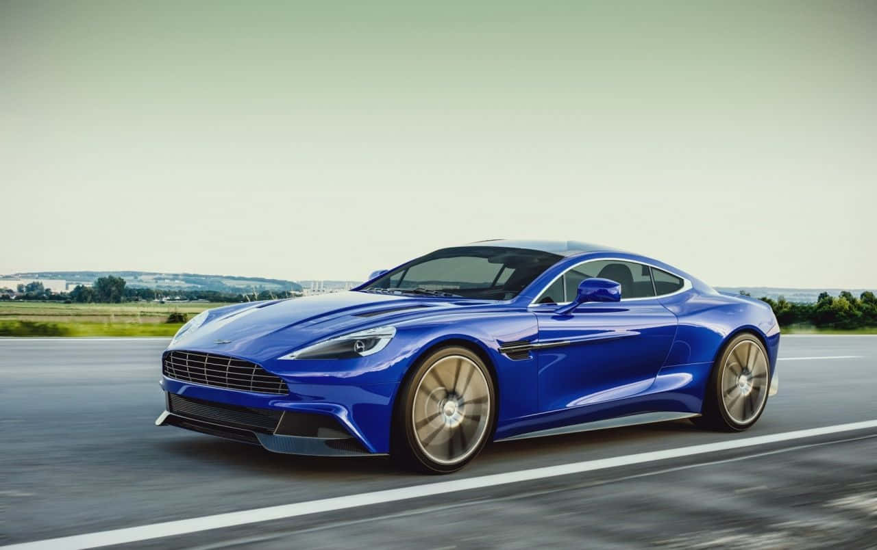 Trải Nghiệm Sức Mạnh và Sự Thanh Lịch của Aston Martin Vanquish Hình nền