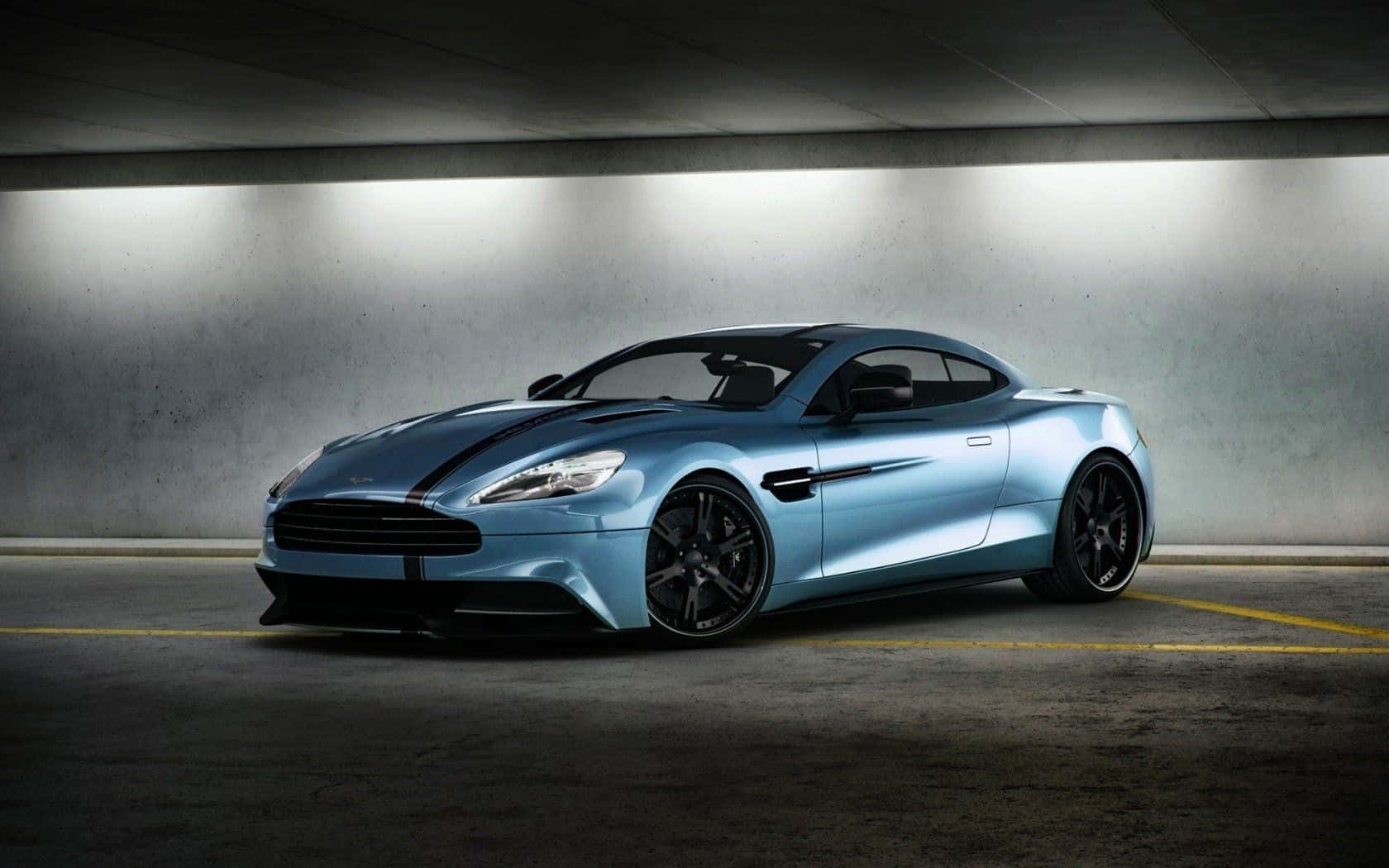 Xe Aston Martin Vanquish bóng bẩy đang chạy Hình nền