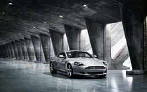 Aston Martin DB9 lướt qua khung cảnh thành phố đẹp như tranh — Steam Deck OLED Hình nền