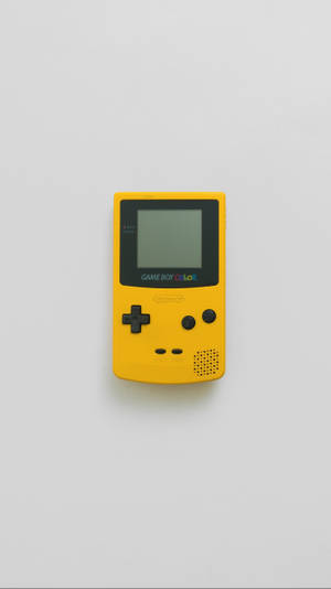 Hình nền máy chơi game Game Boy Color màu vàng đơn giản