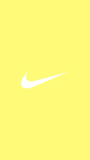 Phong cách pastel vàng dễ thương đầy mê hoặc với biểu tượng Nike huyền thoại — Pastel Vàng Aesthetic Hình nền