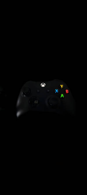 Tay cầm Xbox đen 8K cho điện thoại — Pixel 10 Hình nền