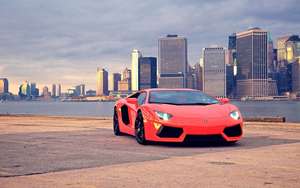 Hình nền xe hơi Lamborghini Aventador màu đỏ tại Công viên Cầu Brooklyn.