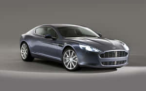Xe Aston Martin Rapide S tinh tế đang chuyển động — Steam Deck OLED Hình nền