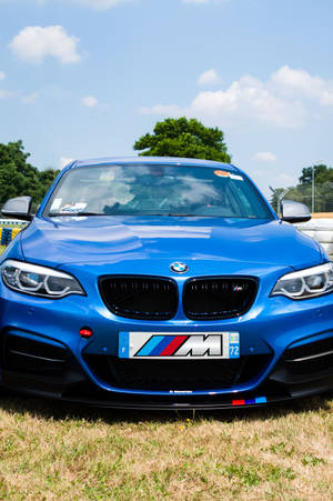 Xe BMW Xanh Tuyệt đẹp Trên Đường đua — Xiaomi Pad Hình nền